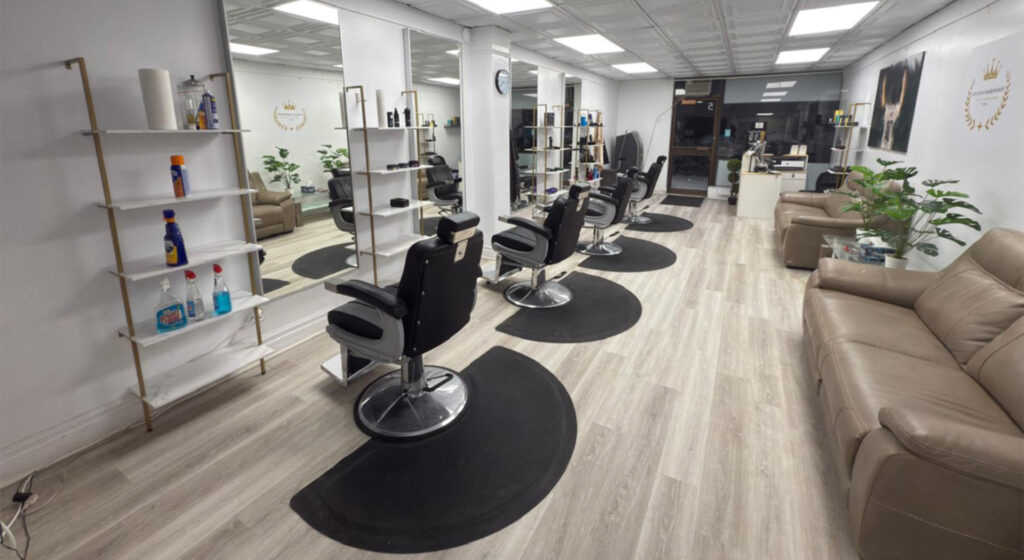 Barber chairs, scissors, hair dryers, barber-related merchandise, customer chairs, and air conditioning. chateaubarbershop.ca from inside